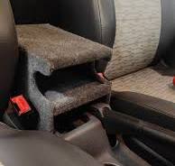 Custom armrests for a single van seat