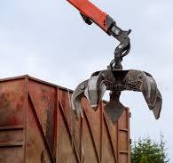 Loading Scrap Metal into a Truck. Crane Grabber Loading ...
