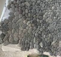 Can pebble stone sheets be cut with a tile wet saw?