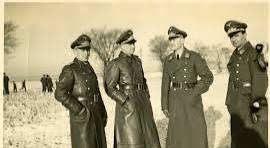 German officers standing together in snow in probably ...