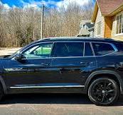 VW Atlas R line with 21 inch black wheels and chrome delete