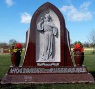 Red granite family monument with bas relief of Jesus and two ...