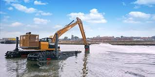Floating excavator - Bell Dredging Pumps