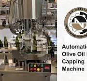 Olive Oil Bottle Capping Machine Manufacturer | N.K. ...