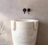 Hand-Carved Drum Pedestal Sink, Drum-shaped marble basin anchors sleek  spaces with purposeful artisan strength.