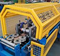 China Shelf Pillar V Angle Truss Steel Roll Forming Machine