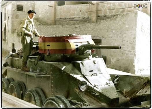 A Soviet BT-7 tank with a conical turret and a tactical ...