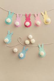 Pom Pom Bunny Tail Easter Garland In A Few Steps Easter Garland Easter Colors Easter Crafts