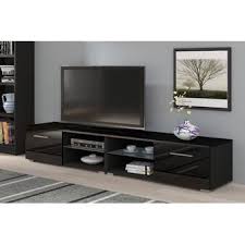 Black 70 Inch Tv Stand Casares Tv Stand For Tvs Up To 70 In 2020 Tv Stand Tv Stands And Entertainment Centers Cool Tv Stands
