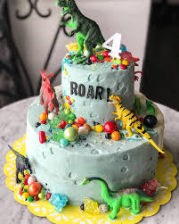 Dinosaur Birthday Cake For 4 Year Old Boy When The Cutest Little 4 Year Old Is Obsessed With Dinosaurs And Candy Hellofashi 4 Year Old Boy Birthday Dinosaur Birthday Cakes Birthday Cupcakes Boy