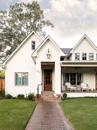 Black And White House With Wood Door White Brick Home With Wood Front Door Willow Homes Modern Farmhouse Exterior House Exterior Farmhouse Exterior