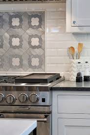 Range Accent Tile Backsplash The Accent Tile Above The Cooktop Is A Marble Mosaic It Is From Backsplash Tile Design Kitchen Remodel Kitchen Tiles Backsplash