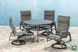 This Backyard Creations 5 Piece Legacy Dining Collection Features A Rust Fre Patio Furniture Collection Outdoor Patio Furniture Cover Rustic Patio Furniture