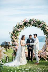 Circular Floral Arches Why Your Wedding Ceremony Needs This New Trend Wedding Ceremony Arch Wedding Arch Fun Wedding Decor