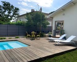 Terrasse Bois Plage Piscine Creusee Terrain De Petanque Jardin Moderne Jardin Moderne Jardins Creation Jardin
