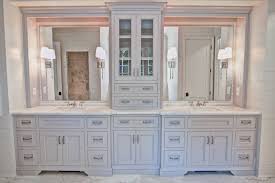 Gorgeous Double Vanity With Center Tower For Extra Storage By Johnson Custom Cabinets Inc W Bathroom Storage Tower Master Bathroom Vanity Master Bath Vanity