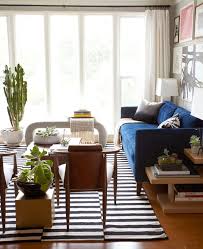 Living Room Ikea Black And White Rug 7 Insanely Cool Rooms That Started With An Ikea Area Rug Home Ikea Shopping Home Decor