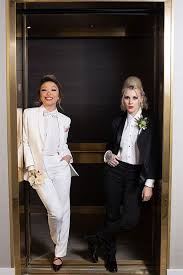 How To Rock A Women S Tuxedo At Your Wedding Women Suits Wedding Tuxedo Women White Wedding Suit