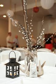 Pin By Shelby Reifke On Wedding Wedding Centerpieces Hunting Wedding Theme Outdoor Wedding Centerpieces