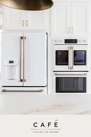 Black And Gold Kitchen Appliances Matte White Finishes Set The Canvas And Our Distinct Line Of Customizable Hardware Op Stainless Appliances Kitchen White Kitchen Appliances Kitchen Renovation