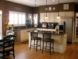 Dark Walls With Cream Cabinets Brown Walls Kitchen Brown Kitchens Kitchen Colors