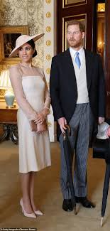 Meghan S First Outfit After Marrying Prince Harry Totted Up To Over 21 000 And Included A Carti Meghan Markle Outfits Meghan Markle Style Meghan Markle Dress