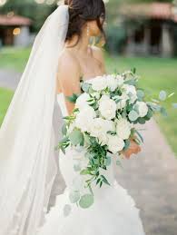 A Classic White And Greenery Wedding With Rustic Charm White Roses Wedding White Wedding Bouquets White Rose Wedding Bouquet
