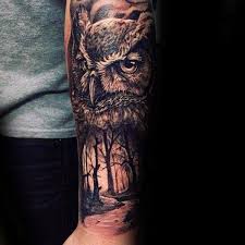 Forearm Bird Of Prey Tattoo Owl With Forest Nature Scene Forearm Tattoos For Guys Tattoosforguys Owl Forearm Tattoo Realistic Owl Tattoo Forearm Tattoo Design