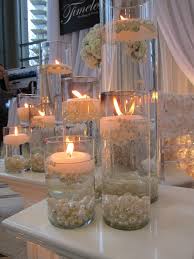Candles With Pearls Whiteweddingcandles Water Wedding Centerpieces Wedding Centerpieces Candle Centerpieces