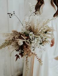 Muted Modern Wedding Inspiration With Dried Flower Arrangements Green Wedding Shoes Dried Flowers Wedding Flower Bouquet Wedding Wedding Flower Trends