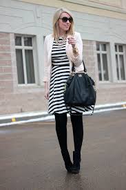 Black And White Dress With Black Tights Black White Striped Dress For A Winter Look Black Tights And Boots White Cardigan White Striped Dress Outfit Black White Striped Dress Striped Dress Outfit