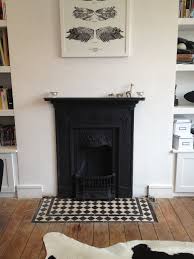 Victorian Cast Iron Fireplace Gives A Warm Touch To The Bedroom Hearth Tiles Victorian Fireplace Victorian Bedroom