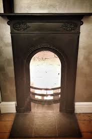 Victorian Cast Iron Fireplace Detail No Hearth Candles Slate Directional Silver Metallic Paint Home Fireplace Fireplace Surrounds Cast Iron Fireplace