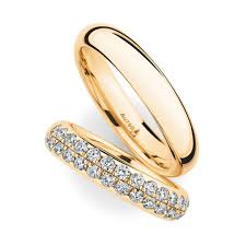 The Brilliants Are Contrasted Against The Yellow Gold Creating A Gorgeous Play Of Colours Wedding Bands For Her Matching Wedding Bands Gold Diamond Wedding Bands