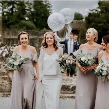 What A Bunch Of Absolute Beauties Aisling And Her Bridesbabes Wear The Mykonos Dress In Concre Unique Bridesmaid Dresses Grey Bridesmaid Dresses Irish Wedding