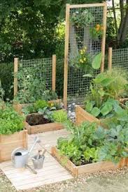 Jardin 25 Diy Faciles A Faire Pour Le Potager Potager Bois Treillis Jardin Carre Potager Bois