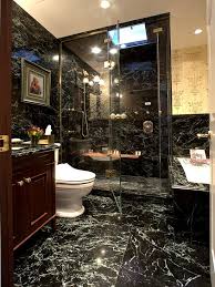 Black And Gold Marble Bathroom Tiles Old World Bathroom With Ornate Sinks And Mirrors Black Marble Bathroom Masculine Bathroom Design Masculine Bathroom