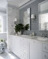 Grey Subway Tile As A Backsplash Behind The Vanity And Mirrors Creates A Focal Point Hampton Style Bathrooms Bathrooms Remodel Traditional Bathroom