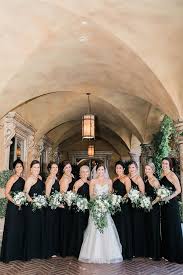 Bridesmaids Wearing Black Long Dresses With The Bride In The Middle And E Black And White Wedding Theme White Black Bridesmaid Dresses Black Bridesmaid Dresses