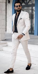 Black And White Business Attire Men Tufanir With A Smart Business Casual Outfit With A White Suit Black Button Up Shirt Sunglasses Black Mens Fashion Classy Mens Fashion Casual Mens White Suit