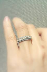 A Rough Diamond Eternity Band Complimented On Either Side By Simple Micro Pave Diamond Bands Ditrjew Eternity Band Diamond Pave Diamond Band Lovely Jewellery