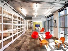 Glass Roll Up Door Used As An Interior Wall Innovative Office Corporate Interiors Interior