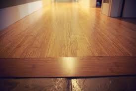 The Simplest Way To Link Floor Tile And Hardwood Of Different Heights Is With A Transition Strip These Strip Flooring Projects Bamboo Flooring Hardwood Floors