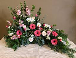 As682 Asymmetrical Arrangement For Behind A Cremation Urn Corals And Whites Featuring Gerbera Memorial Flowers Funeral Flowers Funeral Flower Arrangements