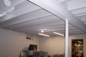 How To Paint A Basement Ceiling With Exposed Joists For An Industrial Look Basement Ceiling Painted Basement Remodeling Basement Ceiling Options