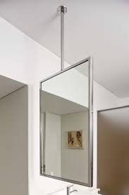 M Is A Suspended Mirror That Uses The Ceiling As Its Only Fixing Point Bathroom Styling Master Bath Mirror Bathroom Decor