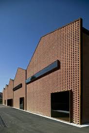 Situated In Parc Dels Torrents One Of The Best Urban Interventions In The City Of Espluges Th Factory Architecture Warehouses Architecture Facade Architecture