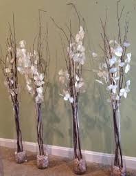 Willow Branch And Silver Dollar Branches In Tall Glass Vases With Small Stones Kissbride Glass Vase Decor Tall Vase Decor Floor Vase Decor