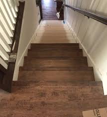 Stairway Makeover Swapping Carpet For Laminate Laminate Stairs Flooring For Stairs Laminate Flooring On Stairs