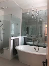 This Master Bathroom Is A Woman S Dream Between The Chandelier And The Bathtub I Don T Know What I Love Master Bathroom Bathroom Goals Custom Home Builders